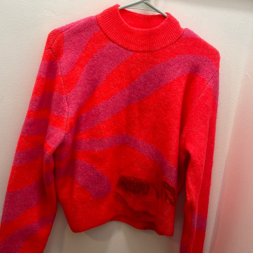 Swirly pink sweater